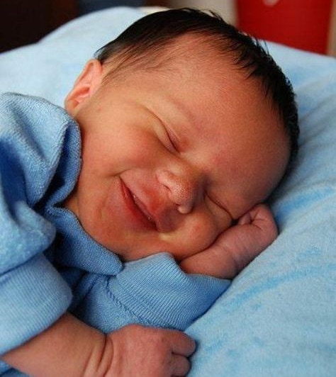 baby sleep laughing