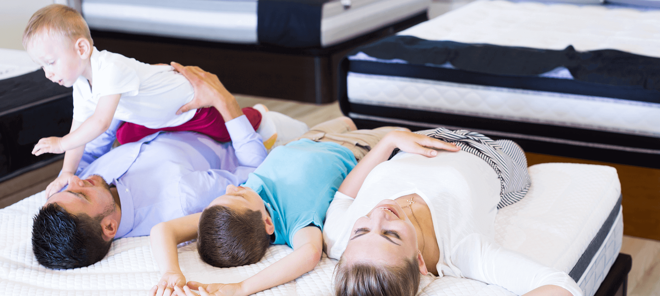 best mattresses for kids - family on mattress